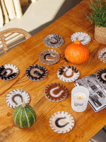 Underlägg i koskinn (2 st.)