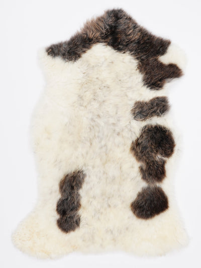 B klasės Flerfärgat fårskinn M