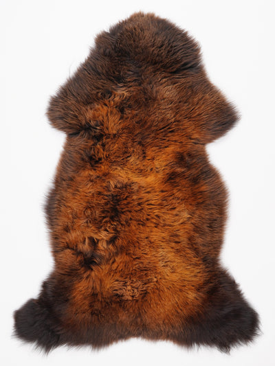 "Rusty" flerfärgat fårskinn L