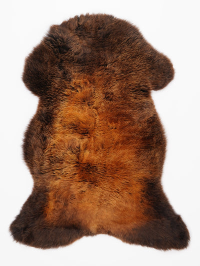 "Rusty" flerfärgat fårskinn L