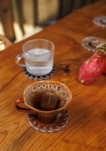 Underlägg i koskinn (2 st.)